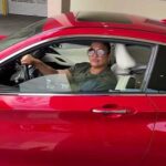 Kimberly Bailey Tureaud in her Infiniti Q60 Red Sport.